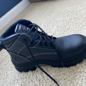 These are Skechers work boots. Very comfortable work boots.